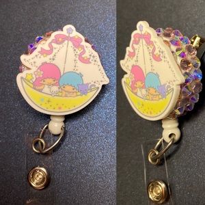 Twin star badge reel